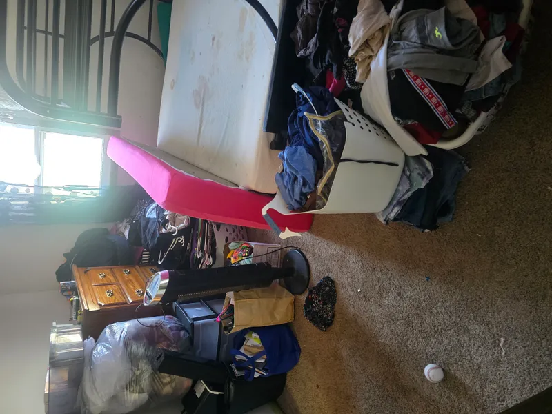 Furniture and items piled high before cleanout